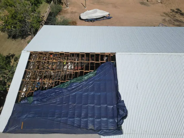 Emergency storm damage roof repair in Mesa